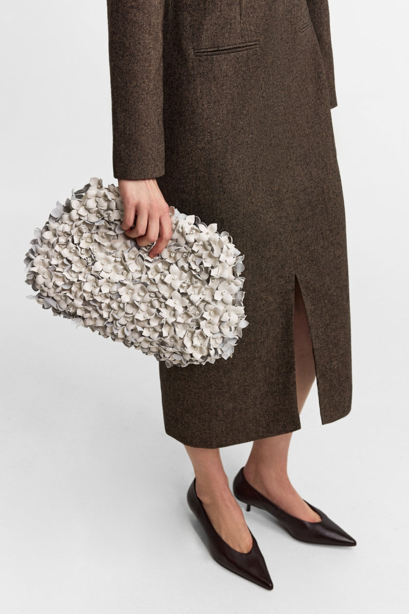 Podyh Hortensia clutch bag in cloud white with elegant design, ideal for evening or special occasions.