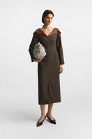 PODYH Hortensia clutch bag in cloud white with elegant design and sleek texture, perfect for stylish evening accessories.