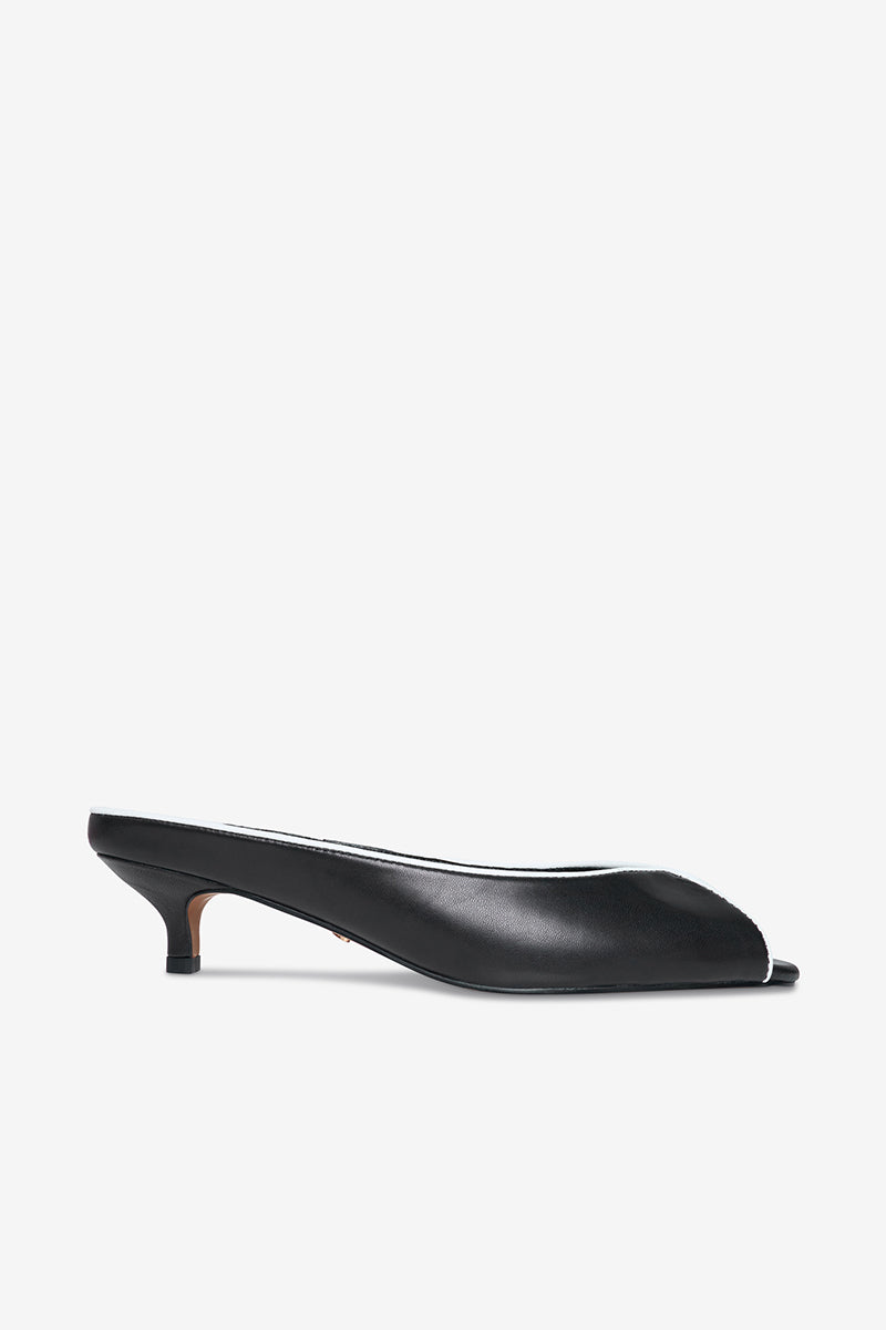 Black AQUILA heels by 10TH FLOOR featuring sleek design and pointed toes, perfect for stylish formal or evening wear.
