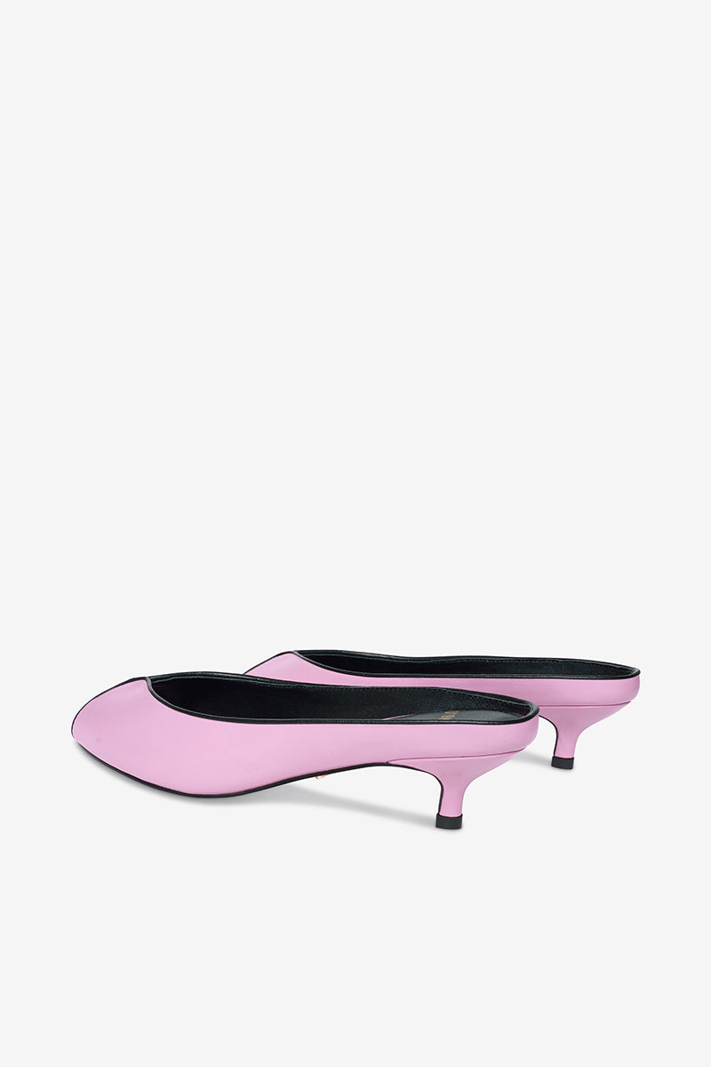 Pink AQUILA heels by 10TH FLOOR featuring stylish stiletto design and sleek ankle straps on a neutral background.