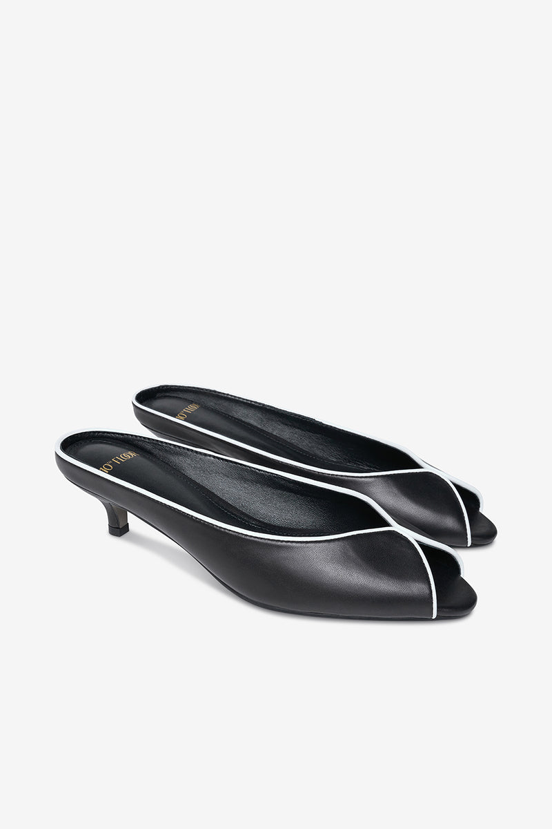 Black AQUILA heels by 10TH FLOOR featuring a sleek design and pointed toe, perfect for elegant and stylish footwear.