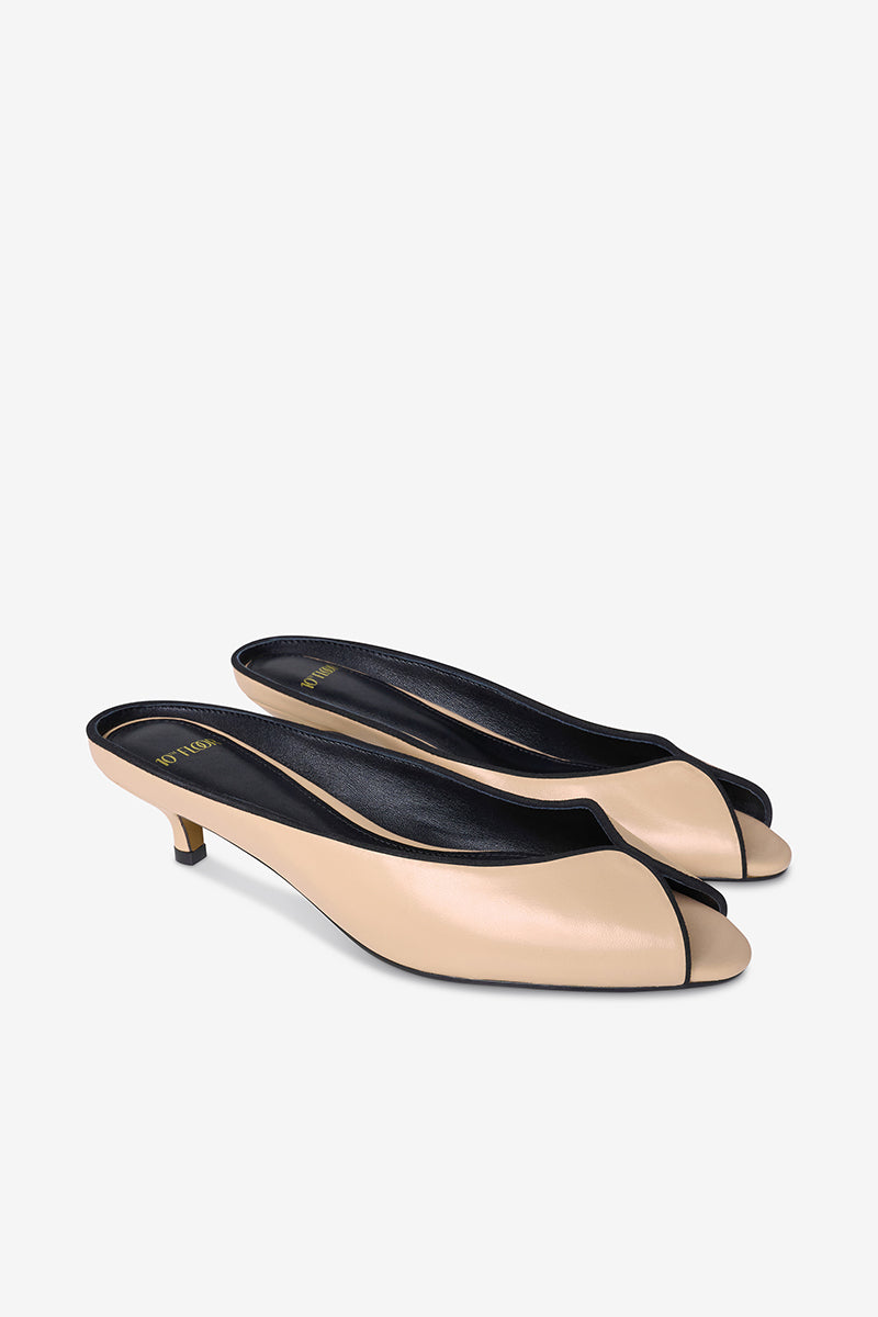 Black AQUILA heels in sand color by 10TH FLOOR featuring sleek design and stylish ankle straps.