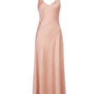 Nude MASTANI Arin Silk Slip maxi dress with a flowing silhouette, displayed on a hanger against a neutral background.