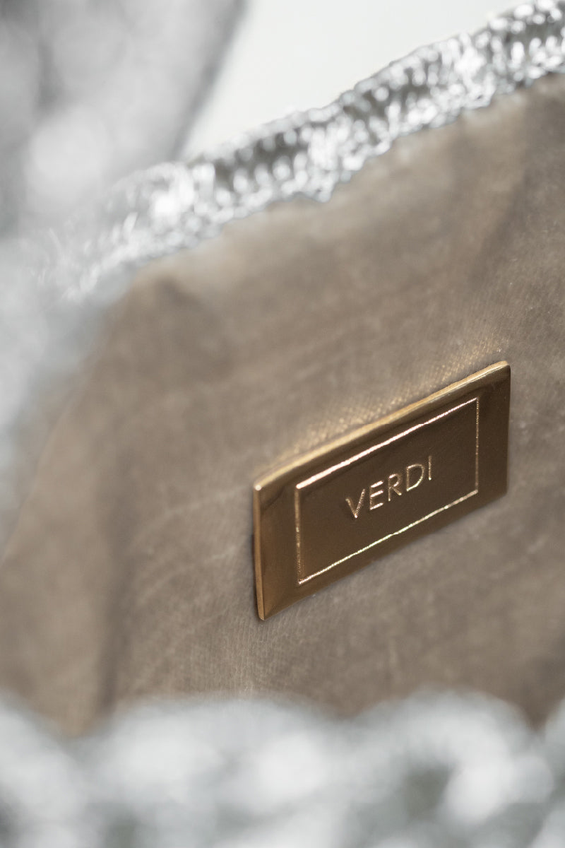 Silver Arista seashell shoulder bag by Verdi, featuring a stylish seashell design and compact size for everyday use.