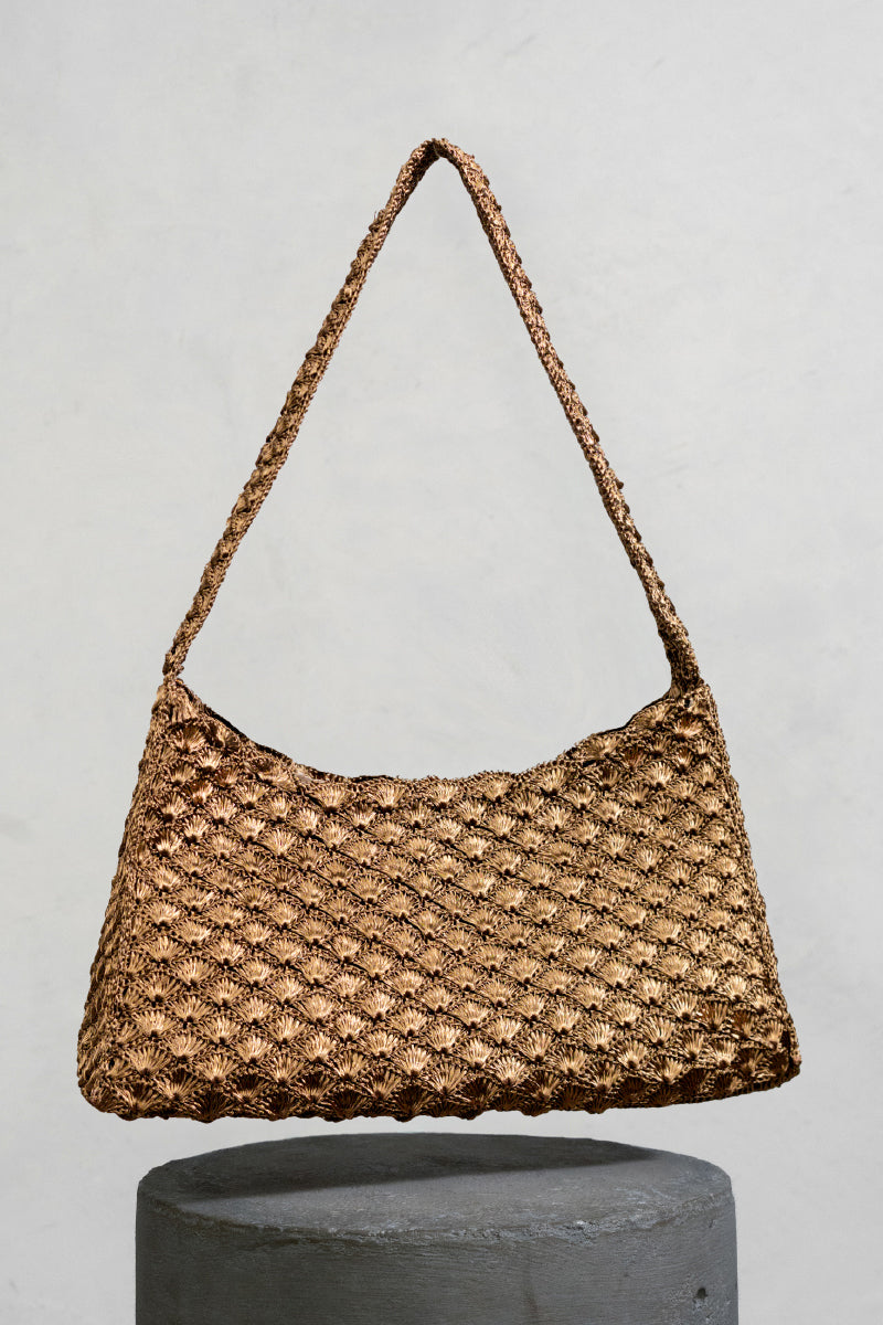 Verdi Arista seashell shoulder bag in antique brass with detailed shell embellishments and sturdy strap for stylish carry.