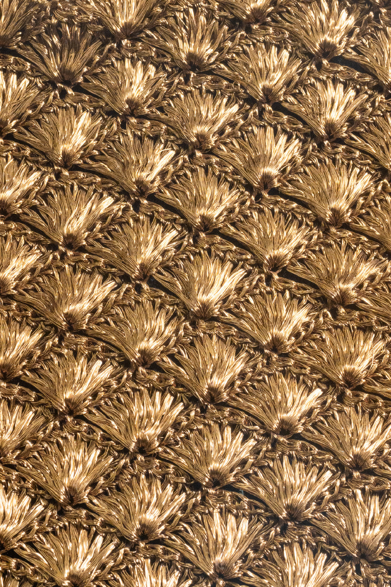 Verdi Arista seashell shoulder bag in antique brass with intricate shell design and elegant strap details.