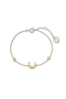 Silver and gold Luna Two Tone Pearl Moon bracelet by Amelia Scott featuring elegant pearl and moon charm design.