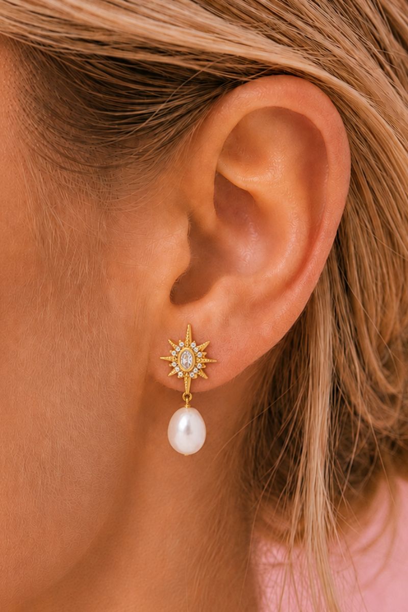 Gold baroque pearl stud earrings featuring moon and star motifs by Amelia Scott, elegant jewelry for special occasions.