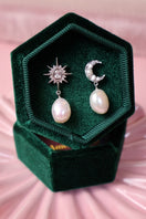 Silver Luna moon and star baroque pearl stud earrings by Amelia Scott featuring celestial design and elegant pearl accents.
