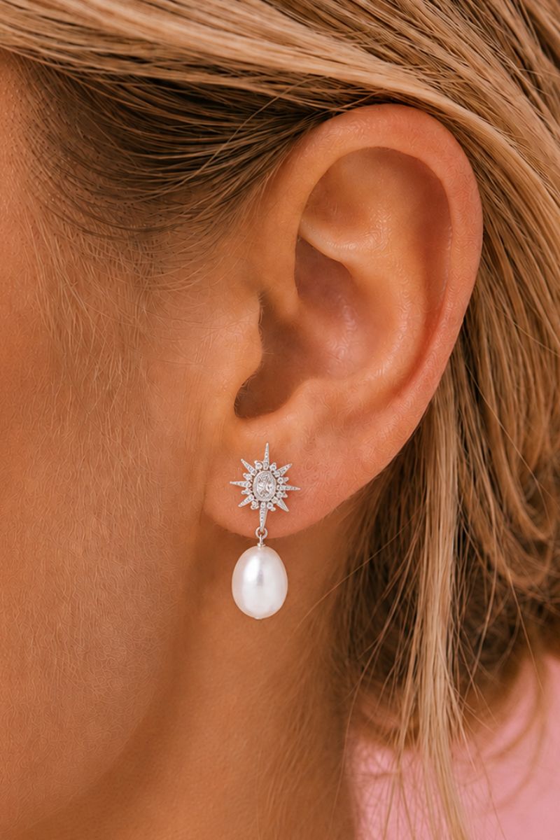 Silver Luna moon and star baroque pearl stud earrings by Amelia Scott, featuring elegant celestial design.