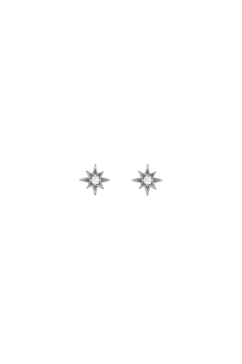 Amelia Scott Ziggy Mini North Star Stud Earrings in clear and silver featuring small star-shaped studs.