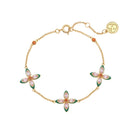 Silver Lucky Clover bracelet by Amelia Scott featuring a delicate charm and braided band design.