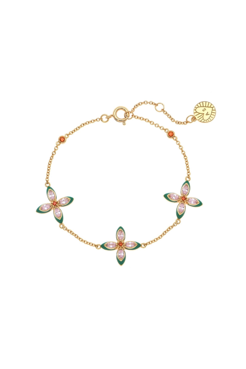 Silver Lucky Clover bracelet by Amelia Scott featuring a delicate charm and braided band design.