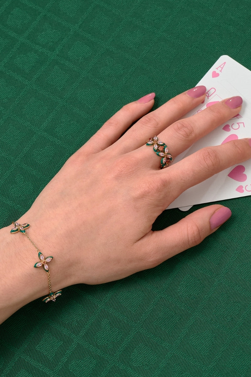 Silver lucky clover bracelet by Amelia Scott featuring a delicate chain and four-leaf clover charm.