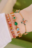 Silver lucky clover bracelet by Amelia Scott featuring four-leaf clover charms on a delicate chain.