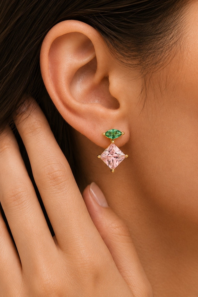 Pink emerald and gold stud earrings by Amelia Scott with a sleek, elegant design, displayed on a white background.