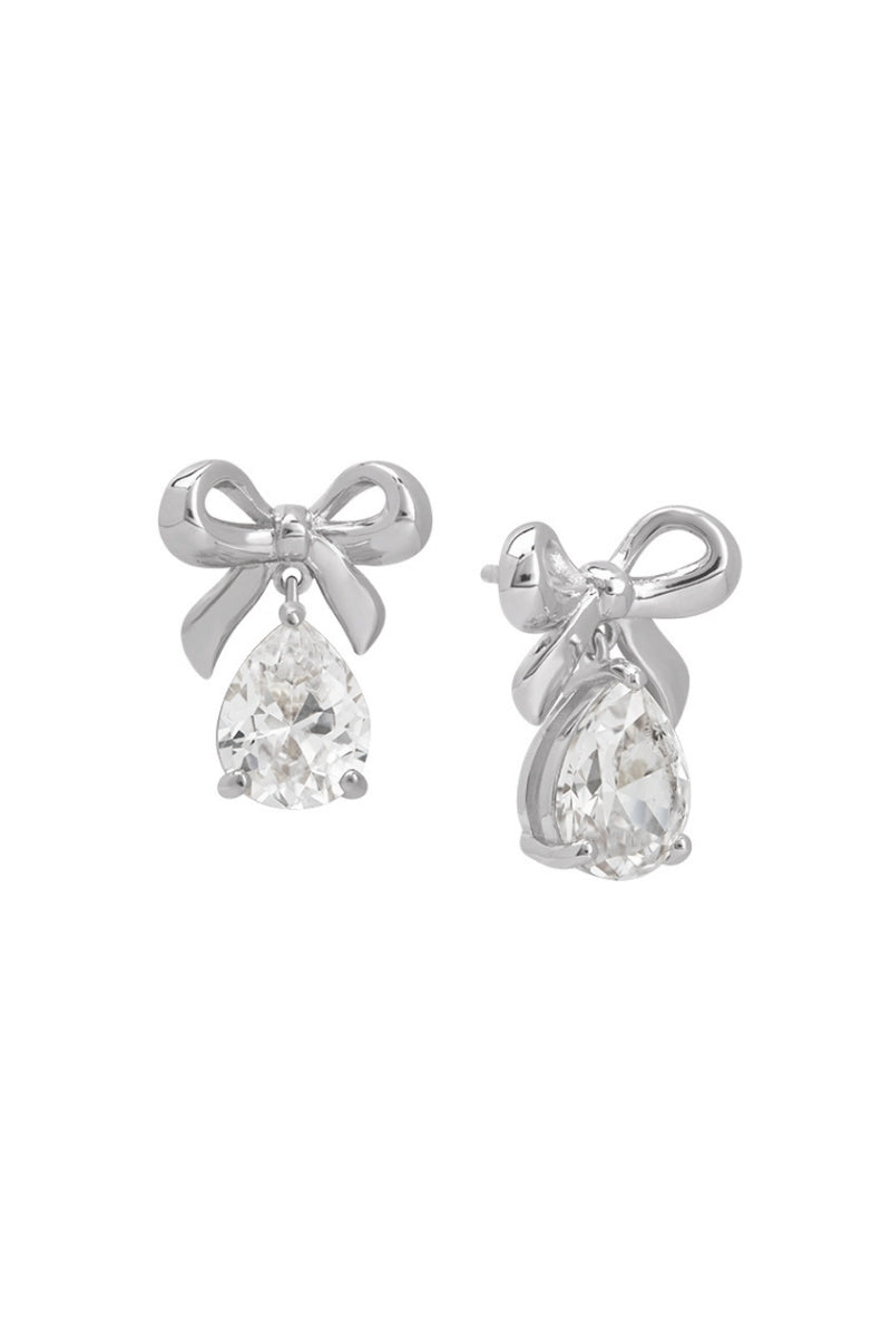 Silver Amelia Scott bow stud earrings with a delicate design, perfect for everyday wear and subtle elegance.