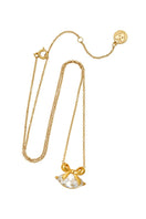 Gold Amelia Scott necklace with a bow pendant featuring clear cubic zirconia stones, elegant jewelry for special occasions.