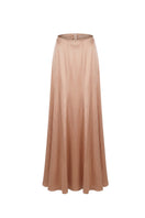 Light beige ASIM silk maxi skirt by Mastani displayed on a neutral background, showcasing its flowing fabric and elegant design.