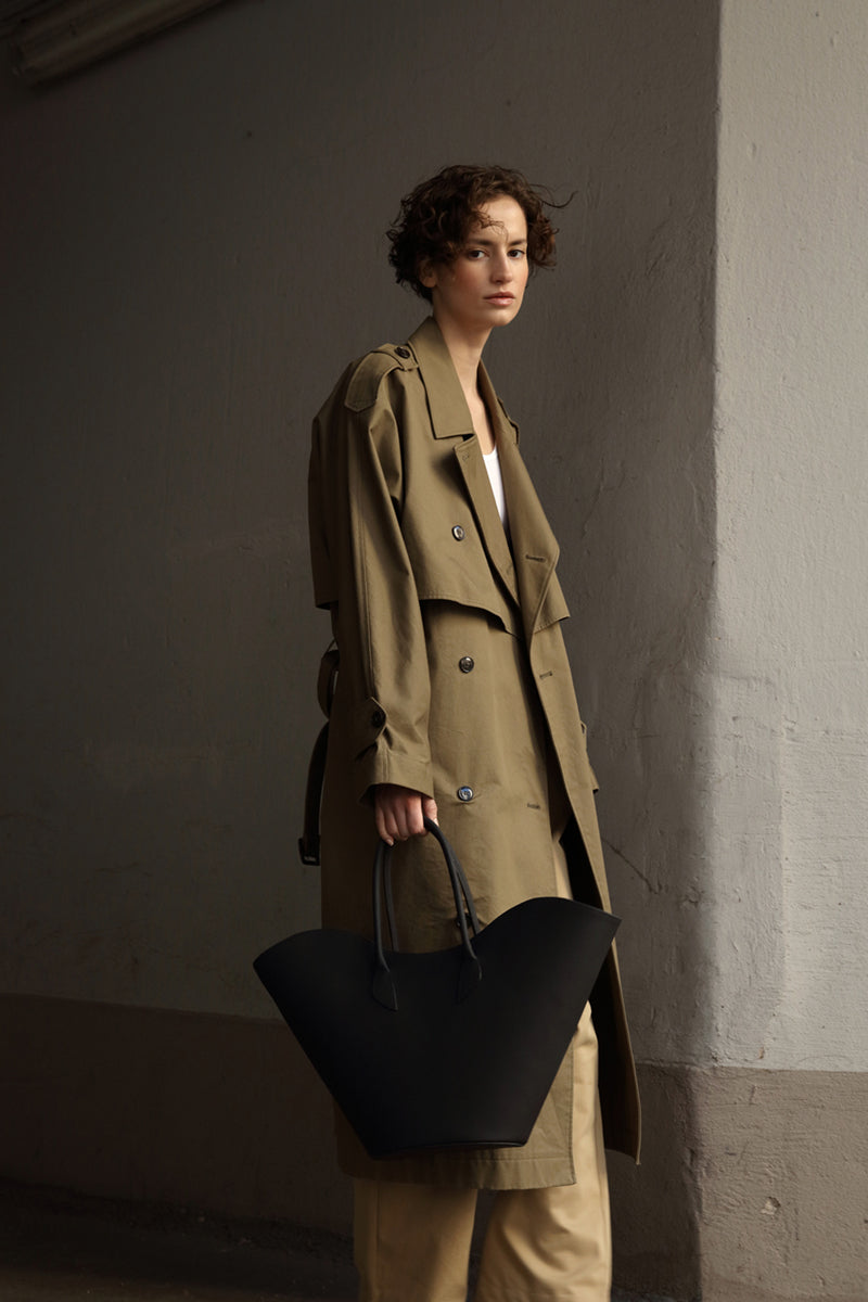 Black Willow shoulder handbag by ASK Scandinavia featuring a sleek design and sturdy strap, perfect for stylish everyday use.