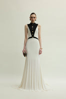 Jenny K Tran Aster dress in ivory and black, elegant gown with flowing fabric and intricate design, perfect for formal occasions.