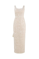 Ivory sequin gown with scoop neck by HACCHIC COUTURE, featuring elegant embellishments and a flowing silhouette.
