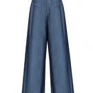Jenny K Tran ATLAN denim pants featuring classic blue denim fabric and a relaxed fit, stylish and comfortable for everyday wear.