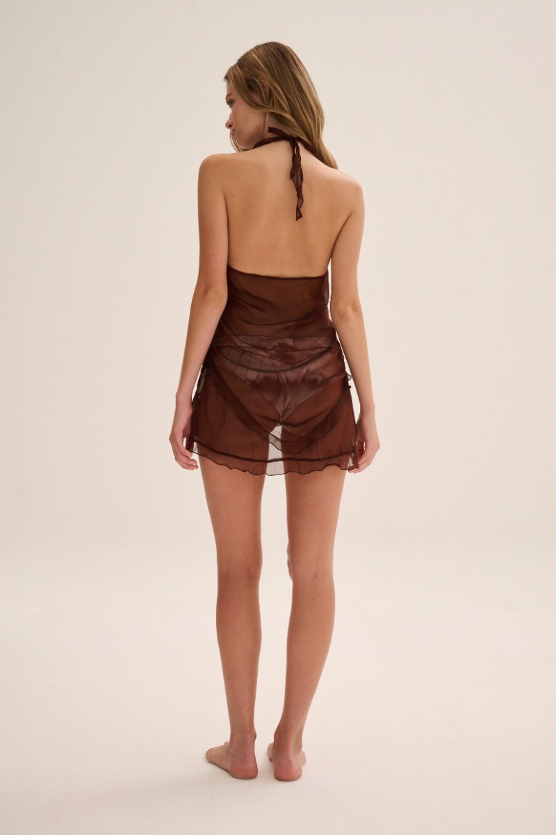 Nelblu Atlas top in brown, stylish sleeveless blouse with a relaxed fit, displayed on a hanger.