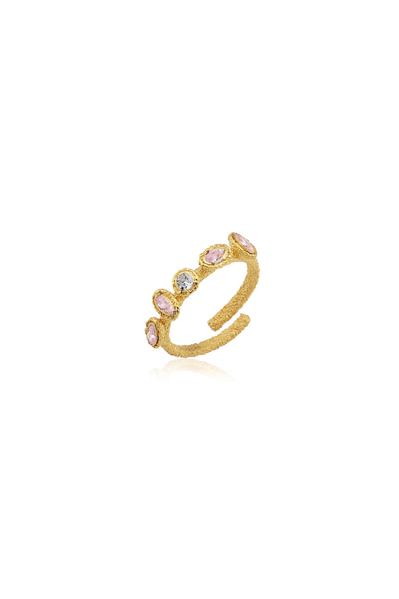 Light pink Aurora ring by PERACAS featuring a sleek, minimalist design on a white background.