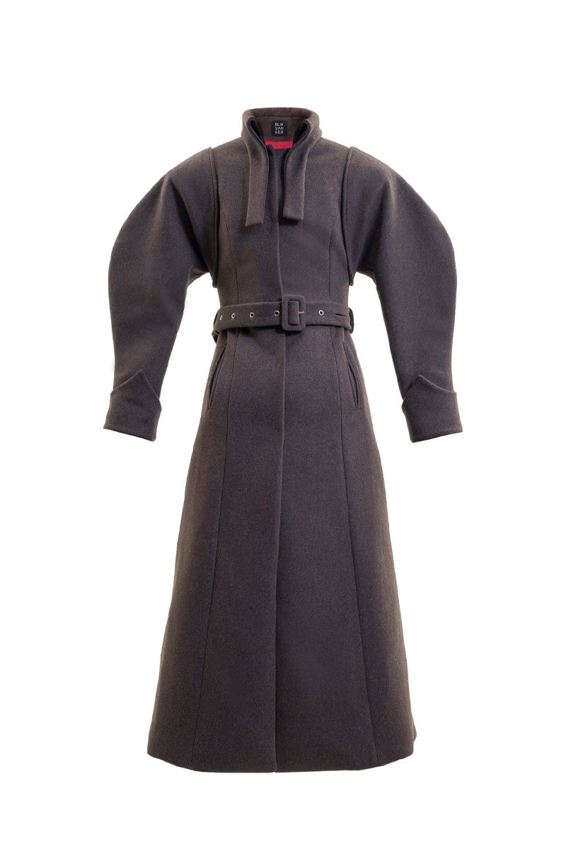 Blikvanger espresso brown puff-sleeved coat with tailored fit, shown in a stylish outdoor setting.