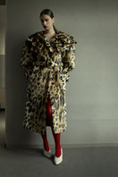 Blikvanger leopard faux fur coat featuring a stylish animal print and plush texture, perfect for fashionable winter wear.