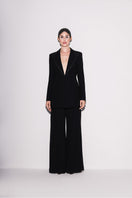 Black Lili Blanc blazer with modern elegance, tailored fit, and structured design, shown from the front.