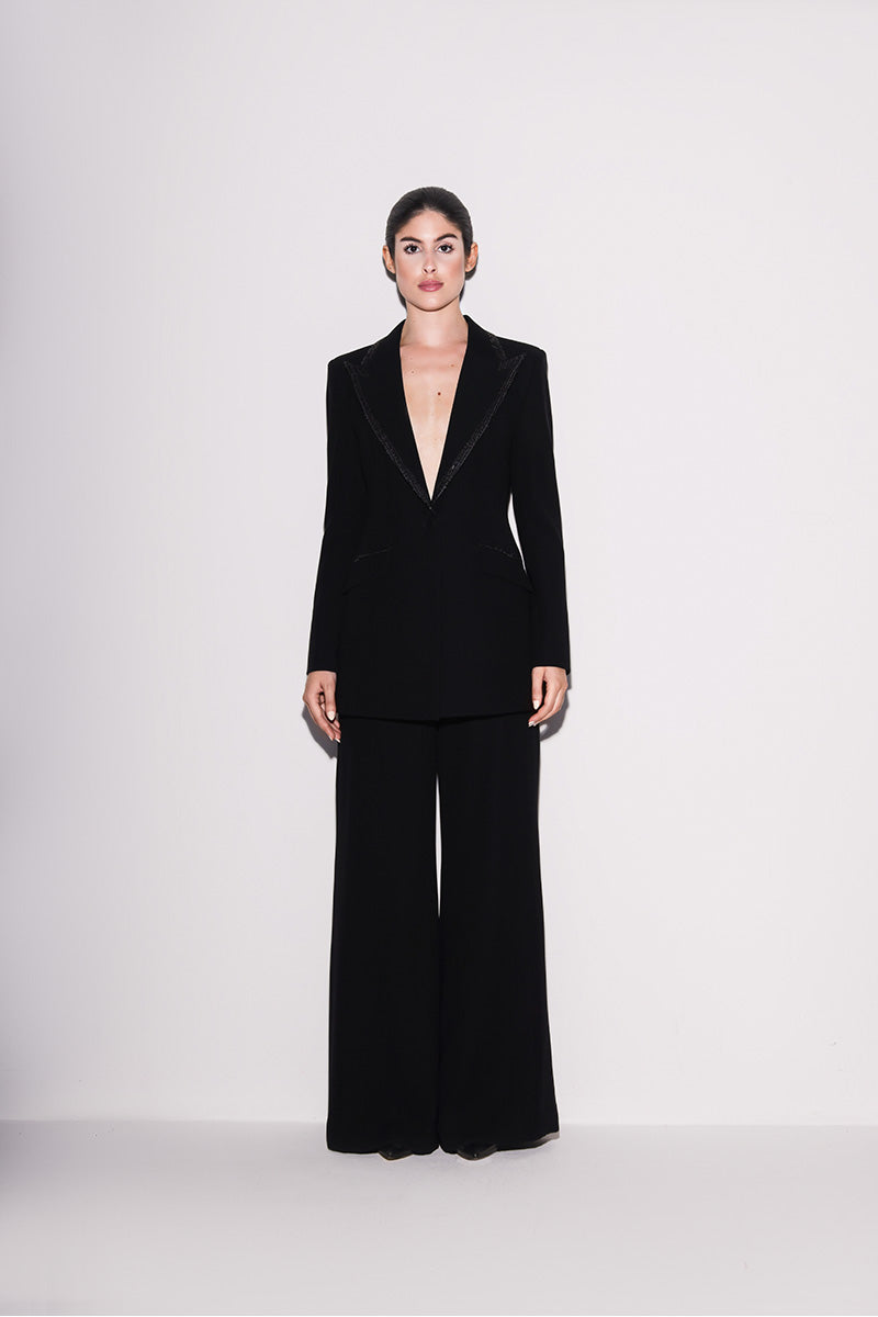 Black Lili Blanc blazer with modern elegance, tailored fit, and structured design, shown from the front.