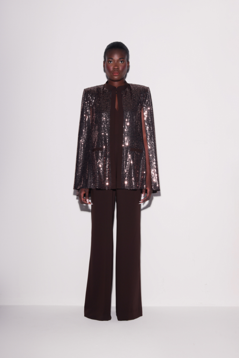 Lili Blanc brown fitted jumpsuit with a sleek design, front view showing tailored fit and elegant style.