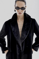 Black vegan faux fur maxi coat by Lili Blanc, showing its plush texture and elegant long silhouette.