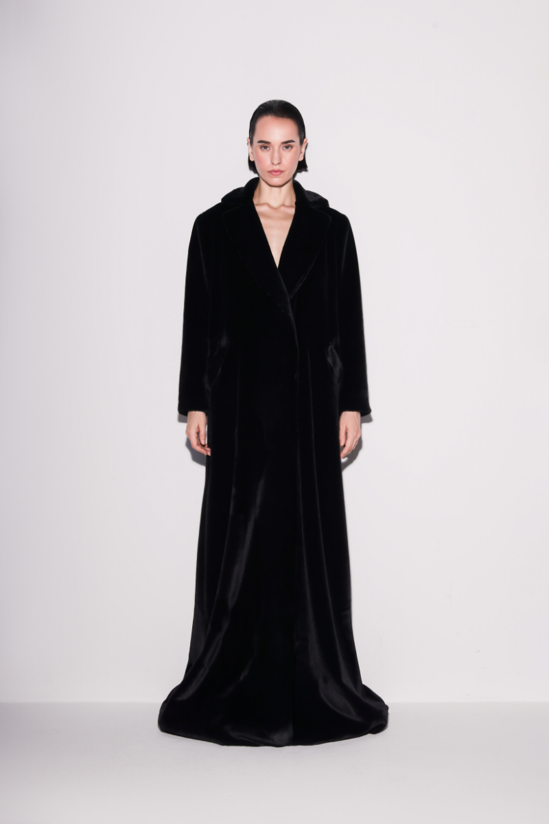 Black vegan fur maxi coat by Lili Blanc, front view showcasing plush texture and elegant length.