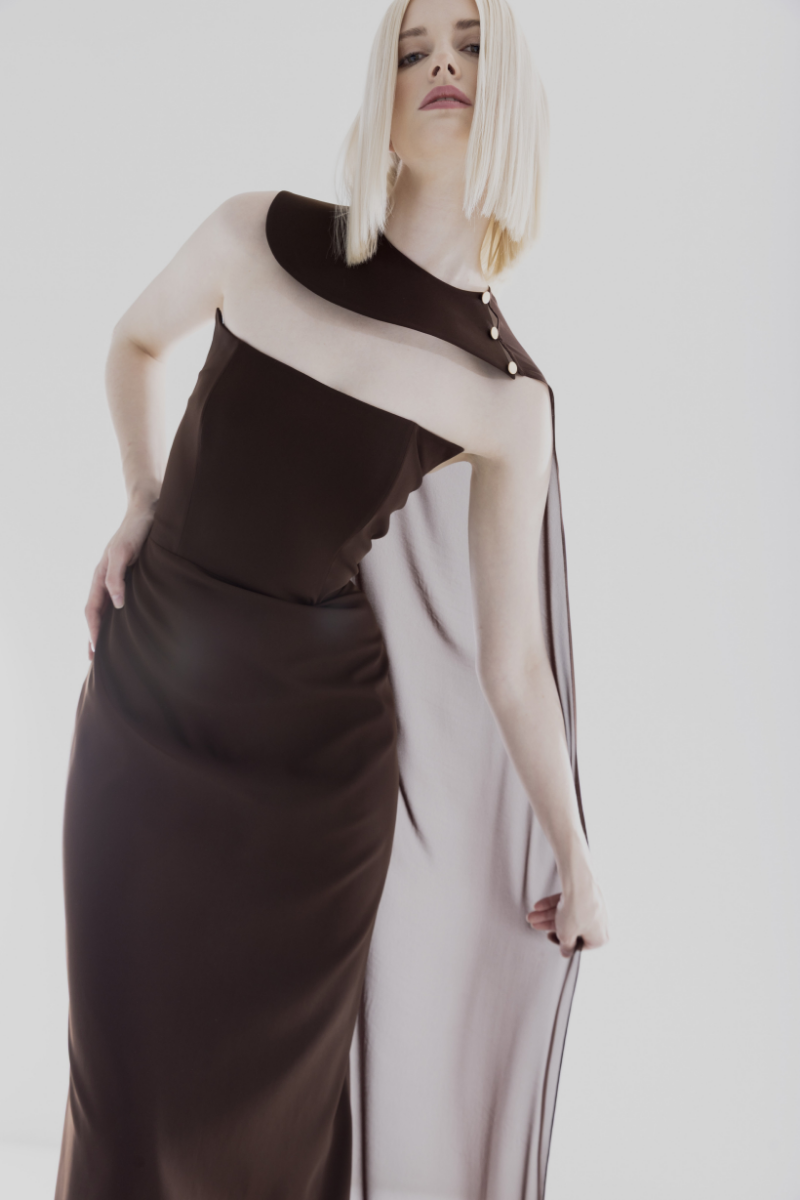 Brown Lili Blanc crepe and chiffon caped gown with elegant flowing design, perfect for formal occasions.