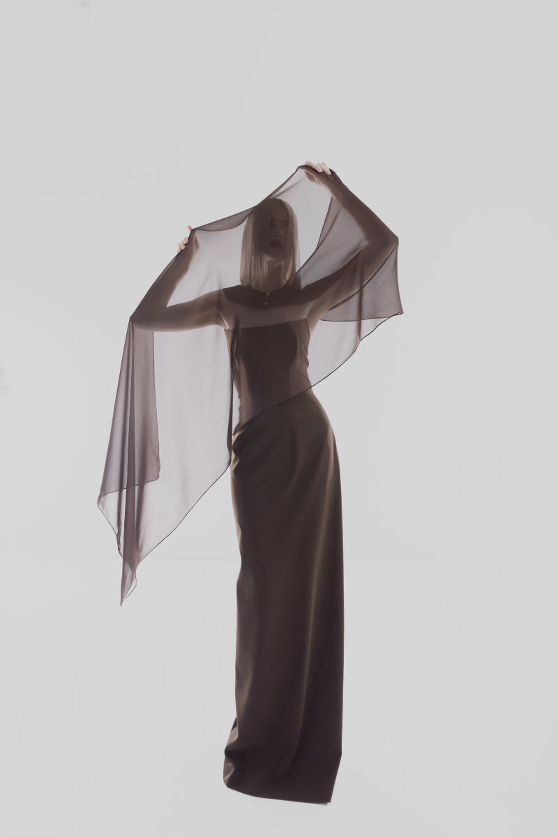 Brown crepe and chiffon caped gown by Lili Blanc, elegant evening dress with flowing cape and sophisticated style.
