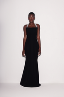 Black Lili Blanc refined power gown, front view showcasing elegant design and tailored fit.