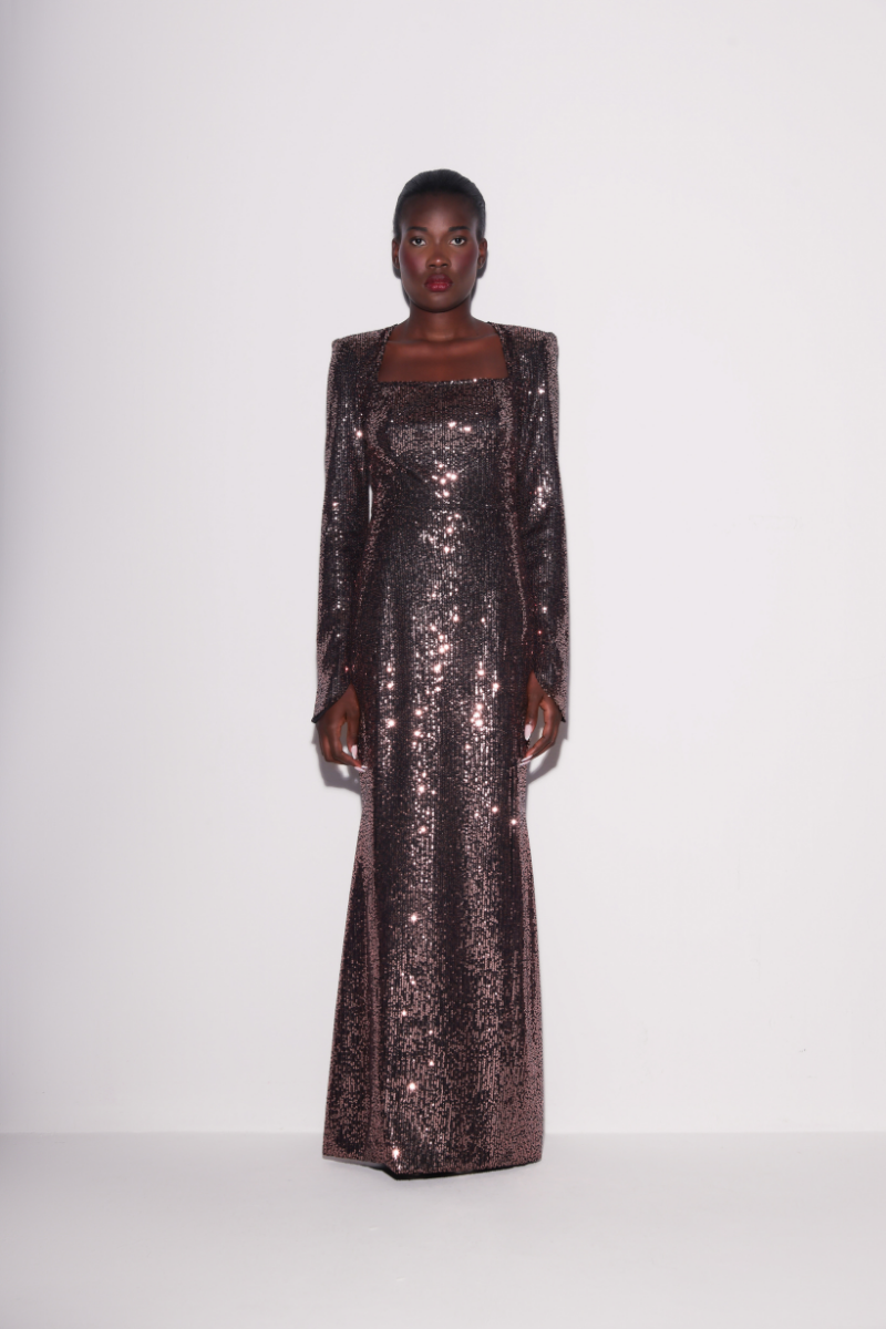 Lili Blanc luminous brown sequin gown with a fitted bodice and flowing skirt, showcasing shiny sequins and elegant design.