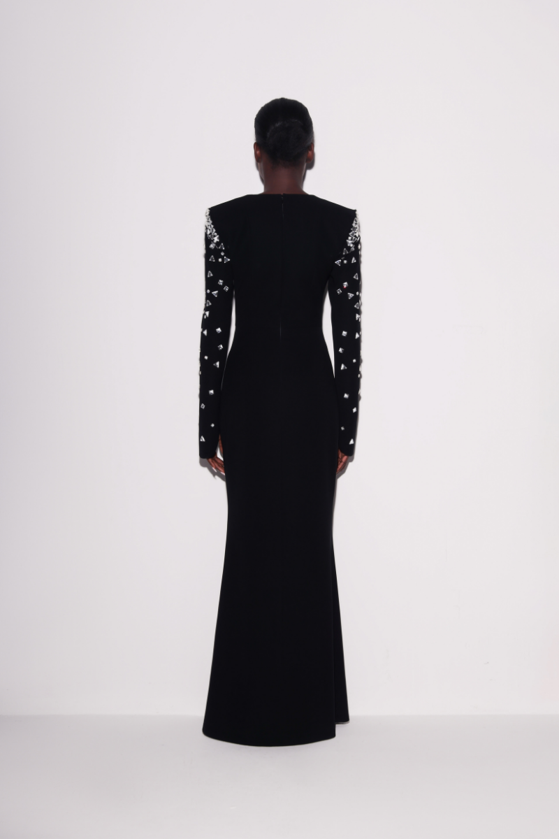 Lili Blanc glamour mermaid gown in black featuring a fitted silhouette and elegant design, shown from the back.