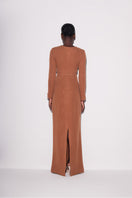 Back view of Lili Blanc elegant knit crop top in brown, showcasing its fitted design and soft knitted texture.