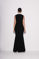 Black crepe mermaid maxi skirt by Lili Blanc, shown from the back, featuring a fitted silhouette and elegant design.