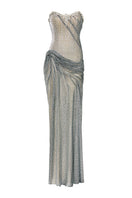 Elegant Celestia Crystal Draped Gown by HACCHIC COUTURE, featuring intricate beadwork and flowing fabric in a luxurious evening design.