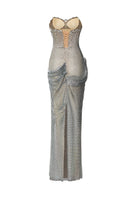 Elegant crystal-draped gown by HACCHIC COUTURE featuring intricate beadwork and flowing fabric, perfect for formal occasions.