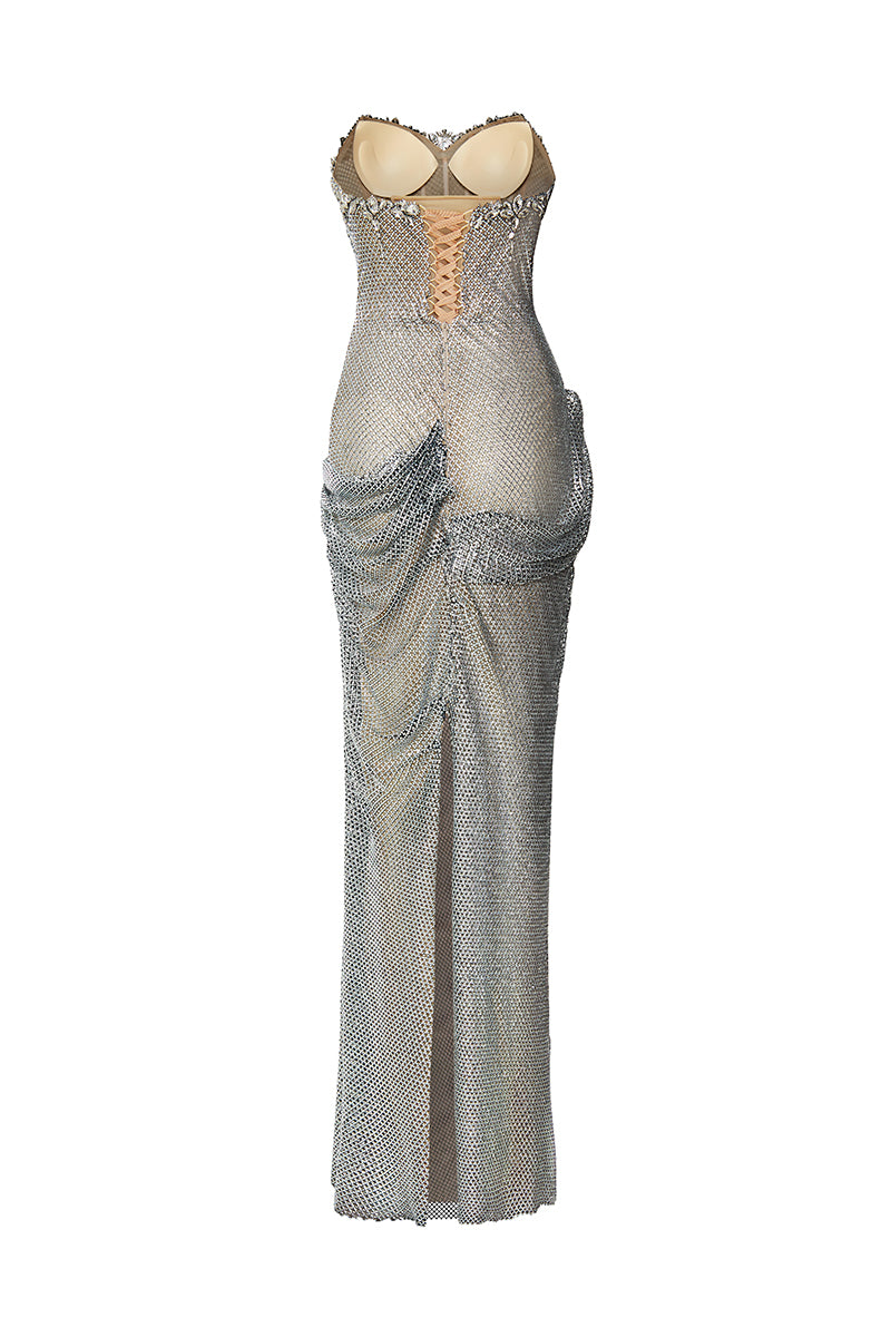 Elegant crystal-draped gown by HACCHIC COUTURE featuring intricate beadwork and flowing fabric, perfect for formal occasions.