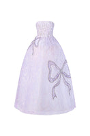 Elegant strapless lilac tulle ball gown by HACCHIC COUTURE with a fitted bodice and flowing skirt, perfect for formal occasions.