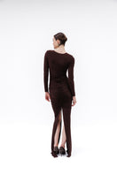 Brown Studio NK Azalea Maxi Skirt displayed on a model, showcasing its flowing fabric and stylish design.