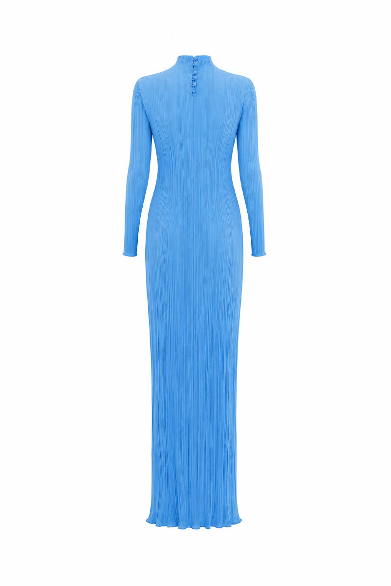 Ice blue Aborigen maxi dress by Maylé Vásquez, flowing fabric with intricate patterns, perfect for elegant summer wear.