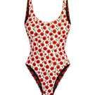 Reversible white and poppy red Acacia one-piece swimsuit by Verdelimon, shown from the front on a model.